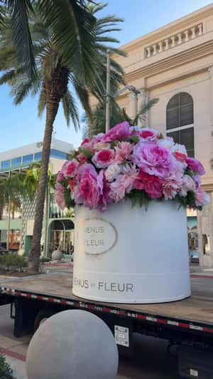 Giant Pink Bouquet on Flatbed Truck in a fake-out-of-home ad of Venus et Fleur