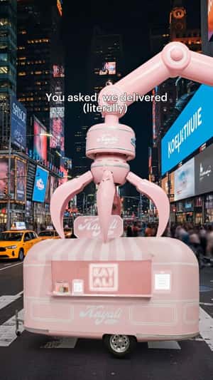 Pop-up Store Transported by Giant Claw in a fake-out-of-home ad of Kayali