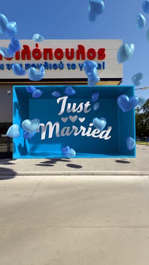 Shopping Carts Got Married in a fake-out-of-home ad of AB Vassilopoulos