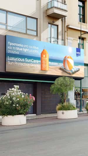 "Luxurious" Bottle Pops Out of Billboard in a fake-out-of-home ad of InterMed