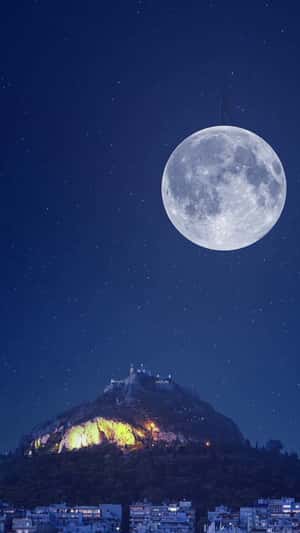 Man Covers Moon with Giant Black Sheet in a fake-out-of-home ad of InterMed