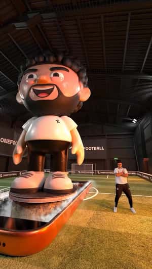 Giant Phone Reveals Younes Avatar in a fake-out-of-home ad of OneFootball