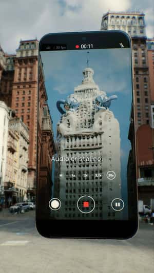 Earphones Cause Waves on Building in a fake-out-of-home ad of Huawei