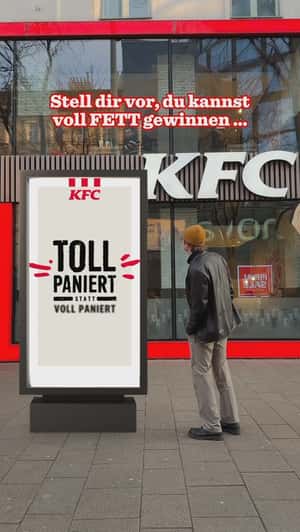 Giant Digital Board Falls on Pavement in a fake-out-of-home ad of KFC