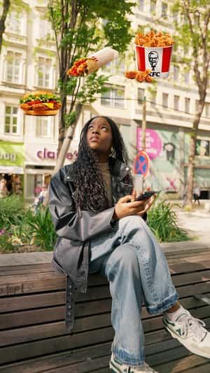 Floating Meal Hover Above Bench in a fake-out-of-home ad of KFC