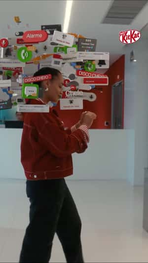 Break Frees Woman from Hovering Alerts in a fake-out-of-home ad of KitKat