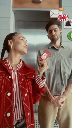 Shared Moment Ends Notification Chaos in a fake-out-of-home ad of KitKat