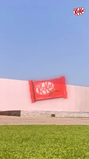 Giant Hologram Turns Into Iconic Installation in a fake-out-of-home ad of KitKat