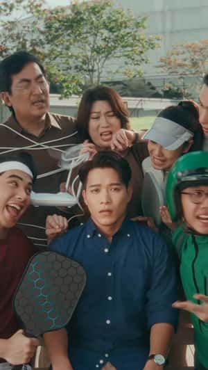 People Lined Up to Pop Out of Giant Phone in a fake-out-of-home ad of KitKat