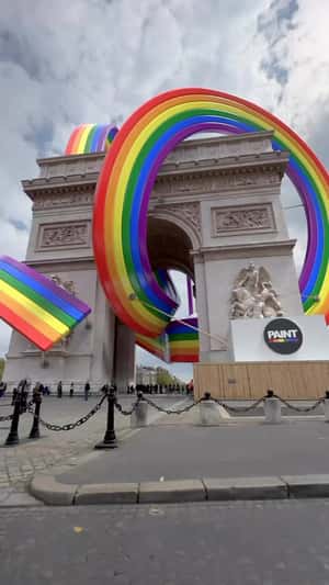 Rainbow Loops Around Arc de Triomphe in a fake-out-of-home ad of Molten Art