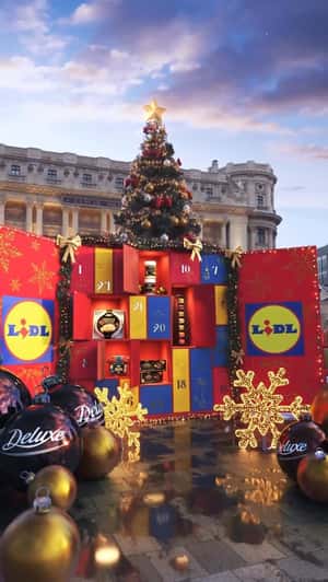 Giant Christmas Box Reveals Deluxe Treats in a fake-out-of-home ad of Lidl