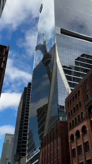 Giant Bag Shadow Sweeps Across Toronto in a fake-out-of-home ad of Winners