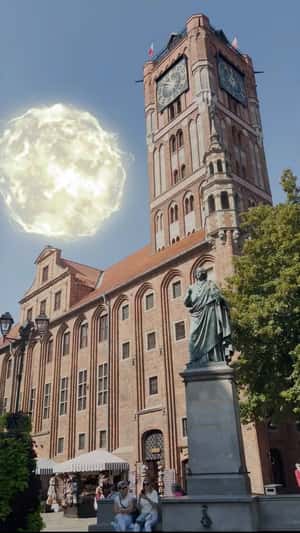 Giant Glowing Orb at Toruń Town Hall in a fake-out-of-home ad of Lotto