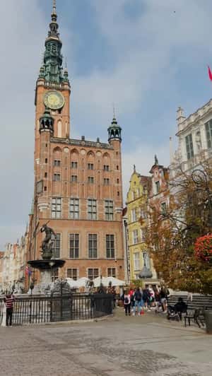 Giant Orb Float at Gdańsk Town Hall in a fake-out-of-home ad of Lotto