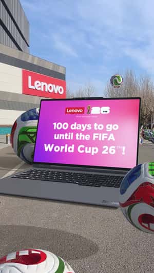 Giant Laptop Emerges from Phone Swipe in a fake-out-of-home ad of Lenovo