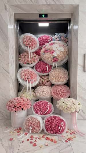 Bouquets Spill from Elevator in a fake-out-of-home ad of Anthurium Flowers