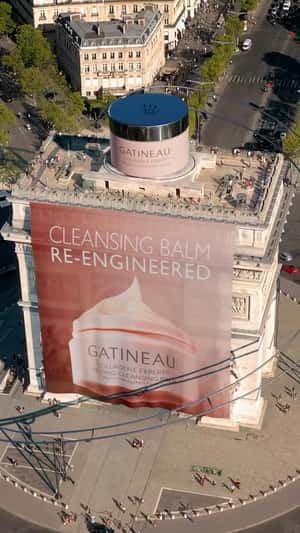 Giant Jar Rolls Around Arc de Triomphe in a fake-out-of-home ad of Gatineau