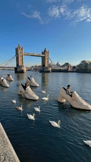 Giant Loafers Drift Along River Thames in a fake-out-of-home ad of ME+EM