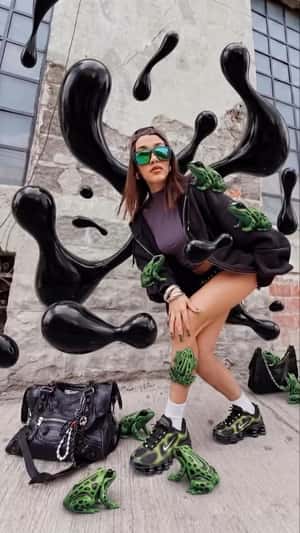 Woman Poses with Frogs and Floating Slime in a fake-out-of-home ad of Lust