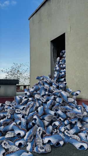 Shoe Avalanche at Back Door in a fake-out-of-home ad of Foot Locker