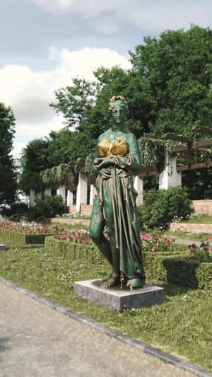 Giant Perfume Bottle in Park in a fake-out-of-home ad of Jean Paul Gaultier