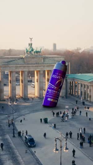 Giant Inflated Volume Spray Floats Away in a fake-out-of-home ad of L'Oréal Paris