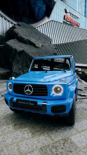 Electric Car Jumps Off Facade in a fake-out-of-home ad of Mercedes-Benz