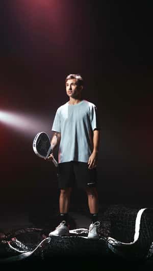 Racket Floats Into Man' Hand in a fake-out-of-home ad of Starvie Padel