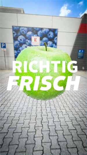 Apple Turns Into Orange in Air in a fake-out-of-home ad of Kaufland