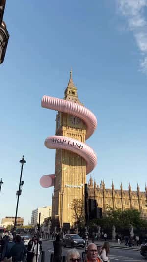 Giant Mascara Wrapped Around Big Ben in a fake-out-of-home ad of Superdrug
