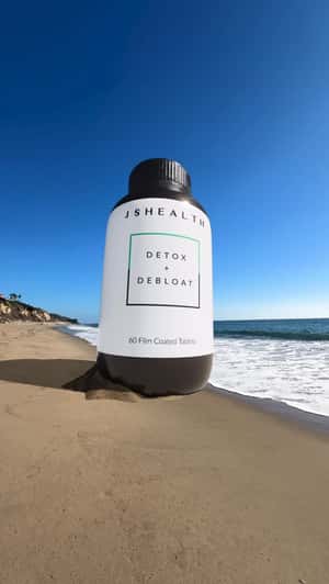 Giant Bottle Inflates on Beach in a fake-out-of-home ad of JSHealth Vitamins