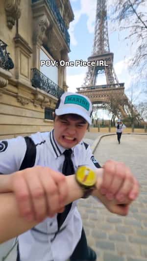 Elastic Arms Swing From Eiffel Tower in a fake-out-of-home ad of One Piece
