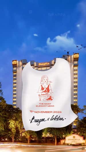 Giant Bib Hangs on Hotel Facade in a fake-out-of-home ad of Shangri-La