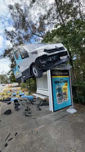 Van Crashes Onto Bus Stop in a fake-out-of-home ad of Hard Fizz