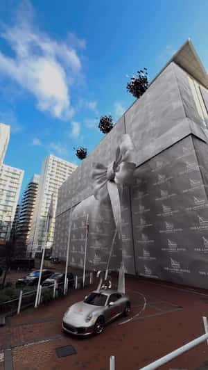 Wrapped Building Gets Unveiled in a fake-out-of-home ad of The Lowry Hotel