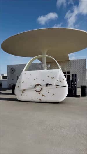 Giant Bag Inflates at Station in a fake-out-of-home ad of Samsøe Samsøe