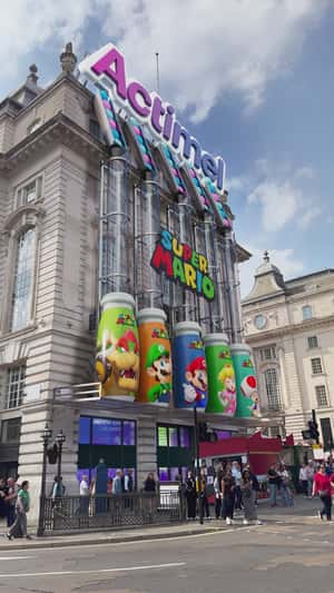 Pills Fall Into Giant Mario Bottles in a fake-out-of-home ad of Actimel