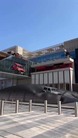 Jeep Cars Bounce Onto Carrier in a fake-out-of-home ad of Automax