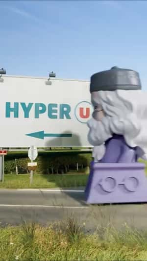 Giant Wizzis Move Toward Store in a fake-out-of-home ad of Cooperative U