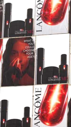 Posters Light Up in Sequence in a fake-out-of-home ad of Lancôme
