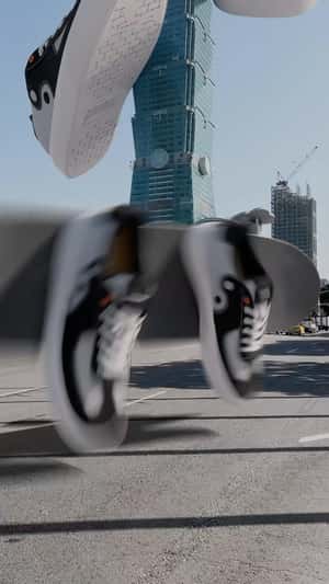 Giant Sneakers Float by Taipei 101 in a fake-out-of-home ad of Unknowndomain