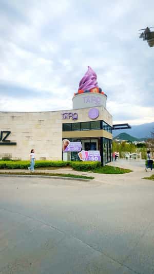 Drone Pours Syrup on Giant Sundae in a fake-out-of-home ad of Taro Haus