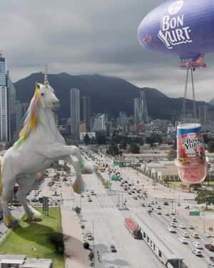 Blimp Excites Giant Unicorn in a fake-out-of-home ad of Bon Yurt Alpina