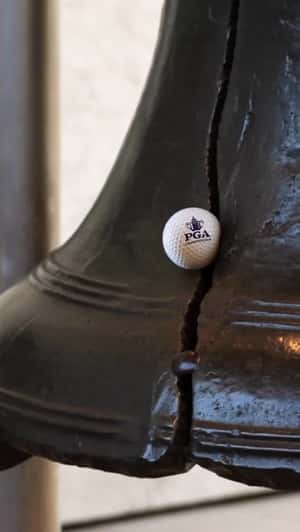Ball Hits Liberty Bell Crack in a fake-out-of-home ad of PGA Championship