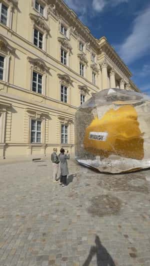 Scarf Frozen Inside an Ice Cube in fake-out-of-home ad of Drykorn