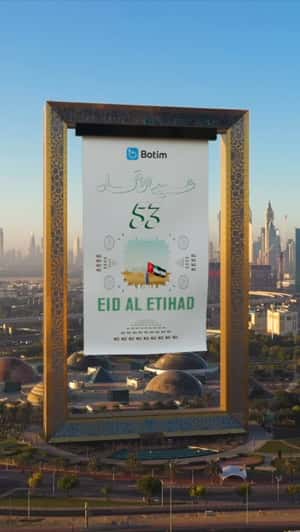 Giant Banner Unfolds on Dubai Frame in a fake-out-of-home ad of Botim