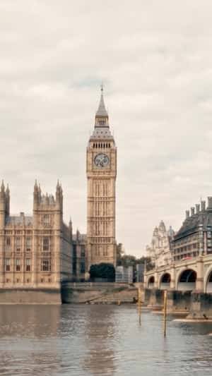 Workers Clean Watch Face on Big Ben in a fake-out-of-home ad of Breitling