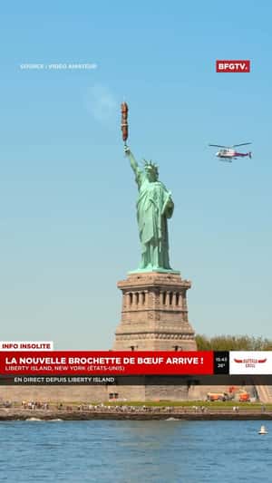 Statue of Liberty Holds Giant Skewer in a fake-out-of-home ad of Buffalo Grill