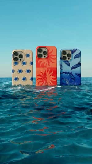 Giant Phones Rise From Sea in a fake-out-of-home ad of Burga
