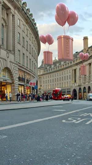 Balloons Carry Giant Lip Balm Boxes in a fake-out-of-home ad of Peitho